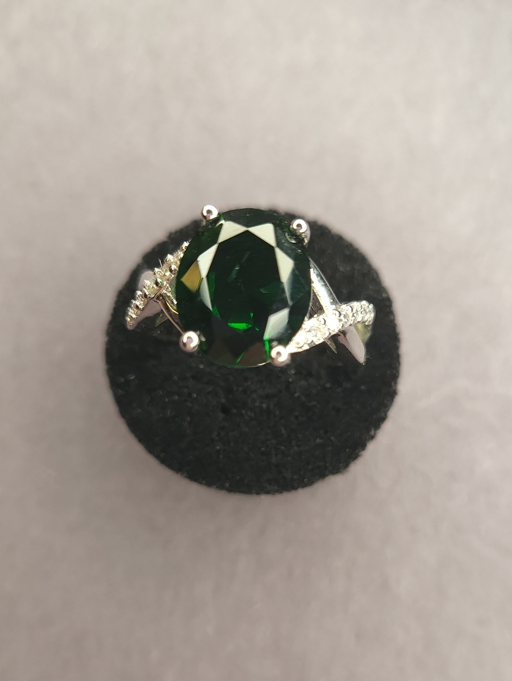 Classic Green Oval Solitaire Ring with Pavé Shoulders